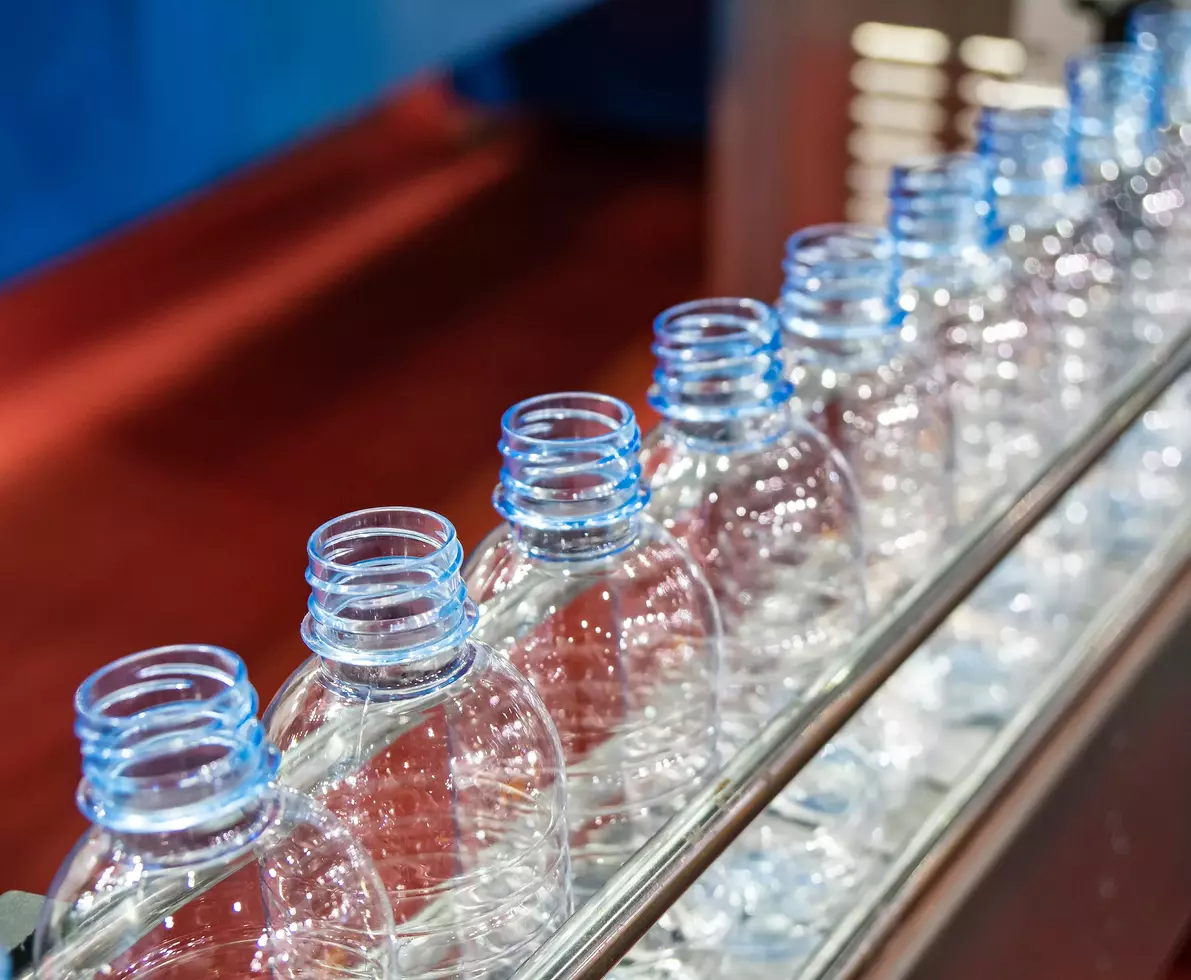 PET bottles in a converyor ready to be filled 