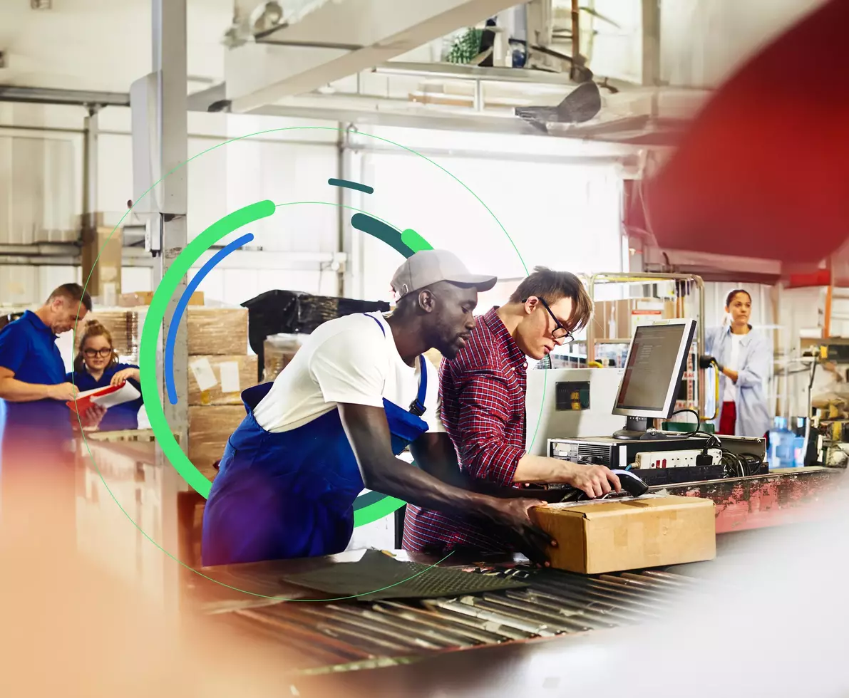 workers in logistics center preparing package for delivery