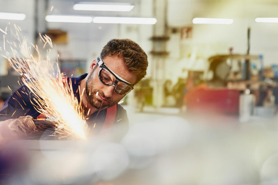 A man working with a tool
